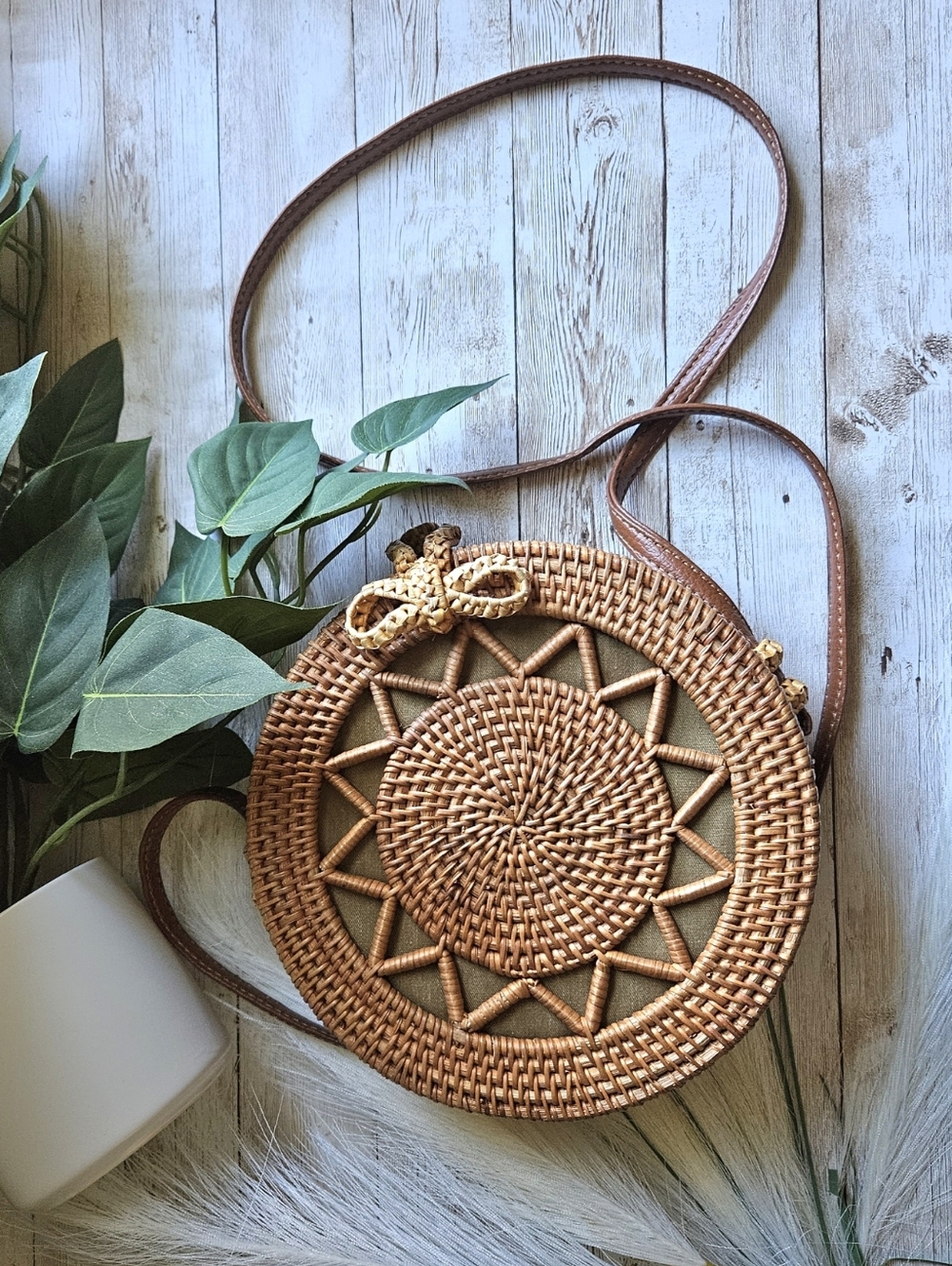 Bohemian handwoven brown round rattan star crossbody bag intricate star or sun